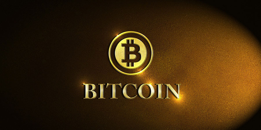 The Bitcoin logo and the word bitcoin in gold and capital letters with a black background
